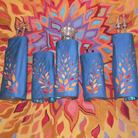 Torah Covers inspired by background tapestry.