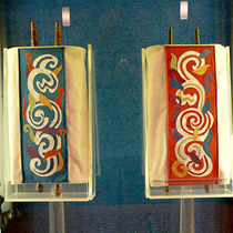 Torah covers depicting the Pillar of Smoke and Pillar of Fire (Temple Israel Chapel)